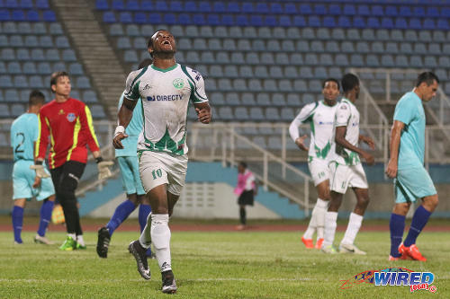 Photo: W Connection attacker Jomal Williams (centre) reacts to the action during 2016 Caribbean Club Championship football against Atlantico FC on 24 February 2016 in Couva. (Courtesy Chevaughn Christopher/Wired868)