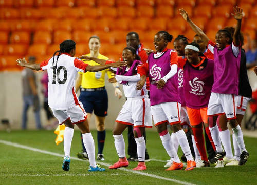 Photo: Trinidad and Tobago attacker Tasha St Louis (far left) celebrates with teammates after her stunning game winning goal against Guatemala in Houston, Texas on 12 February 2016. (Courtesy CONCACAF)