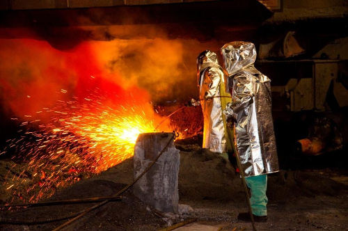 Photo: Steel workers at a blast furnace at ArcelorMittal USA. (Courtesy Glassdoor)