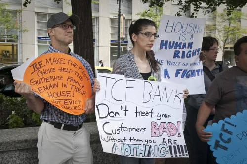 Photo: Home owners protest against bank foreclosures in Chicago. (Copyright ProgressIllinois)