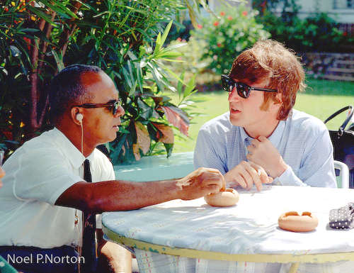 Photo: Trinidad and Tobago's first prime minister Dr Eric Williams (left) hosts late Beatles pop star John Lennon. (Copyright Noel P Norton)