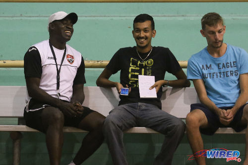 Photo: Trinidad and Tobago National Futsal Team Clayton Morris (left) has a laugh with Wired868 reporter Amiel Mohammed (centre) during an interview at the Maloney Indoor Sport Arena. (Courtesy: Chevaughn Christopher/CA-images/Wired868)