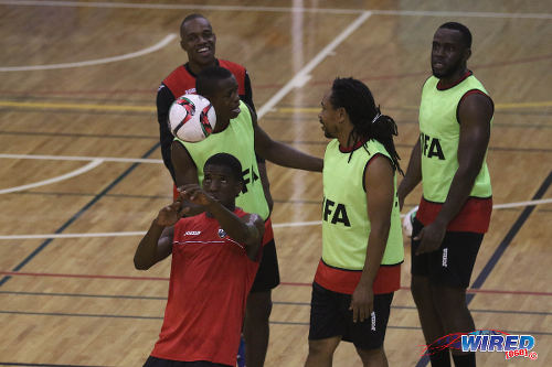 Photo: Trinidad and Tobago National Futsal Team player Jameel Neptune (left) heads the ball during training at the Maloney Indoor Complex. (Courtesy Chevaughn Christopher/CA-images/Wired868)