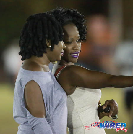 Photo: Female fans snap a selfie during Pro League action between San Juan Jabloteh and Defence Force on 12 March 2016 at the Barataria Recreation Ground. (Courtesy Nicholas Bhajan/Wired868)