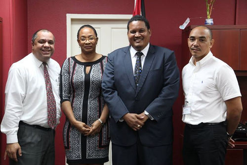 Photo: Trinidad and Tobago Gymnastics Federation officials (from right) Ricardo Lue Shue, Elicia Peters-Charles and David Marquez pose with Sport Minister Darryl Smith (second from right). (Courtesy SPORTT)