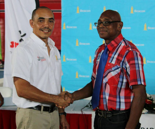 Photo: Trinidad and Tobago Gymnastics Federation second vice president and former president Ricardo Lue Shue (left) shakes hands with Sport Company executive manager Anthony Creed. (Courtesy SPORTT)