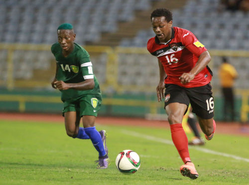 Photo: Trinidad and Tobago winger Levi Garcia (right) leaves St Vincent and the Grenadines right back Akeem Williams in his wake during Russia 2018 World Cup qualifying action at the Hasely Crawford Stadium, Port of Spain on 29 March 2016. Trinidad and Tobago won 6-0. (Courtesy: Allan V Crane/CA-images/Wired868)