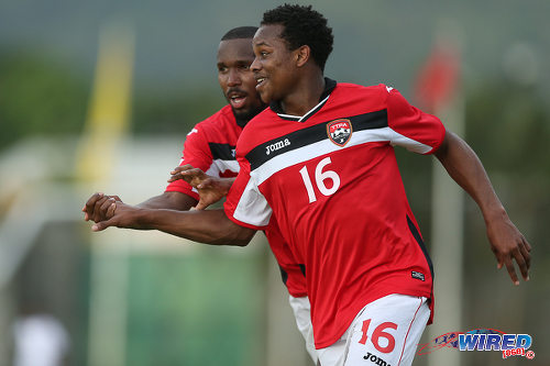 Photo: Eighteen year old Trinidad and Tobago winger Levi Garcia (right) celebrates his second goal with teammate Khaleem Hyland against St Vincent and the Grenadines at Arnos Vale on 25 March 2016. Trinidad and Tobago won 3-2. (Courtesy Allan V Crane/CA-images/Wired868)