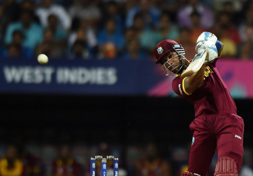 Photo: West Indies batsman Lendl Simmons plays a shot during the World T20 semi-final match against India at The Wankhede Cricket Stadium in Mumbai on 31 March 2016. (Copyright AFP 2016/Punit Paranjpe)