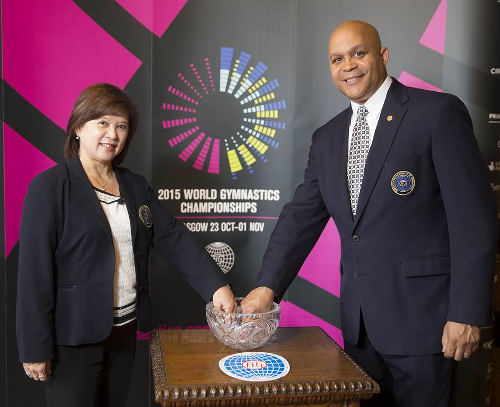 Photo: FIG men's and women's technical committee presidents Steve Butcher (right) and Nellie Kim at the draw for the Glasgow 2015 World Gymnastics Championship.