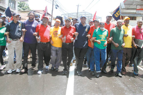 Photo: Leaders of the All Trinidad General Trade Workers Union protest. "We woh we money" is their constant cry. (Courtesy ATGTWU)