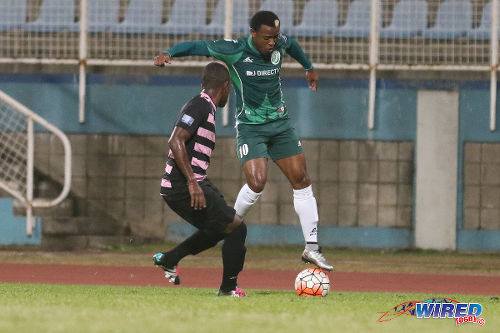 Photo: W Connection attacker Jomal Williams (right) tries a trick on the ball during TT Pro League action against North East Stars on 2 April 2016. Police FC won 1-0. (Courtesy Chevaughn Christopher/CA-images/Wired868)