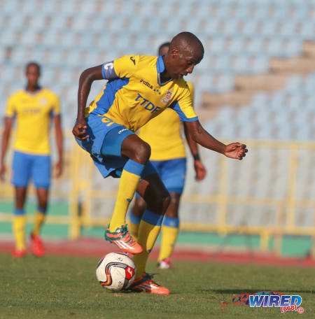 Photo: Defence Force captain and midfielder Jerwyn Balthazar on the ball during action in the Lucozade Sport Goal Shield quarterfinal against Morvant Caledonia United on 9 April 2016. (Courtesy Nicholas Bhajan/Wired868)