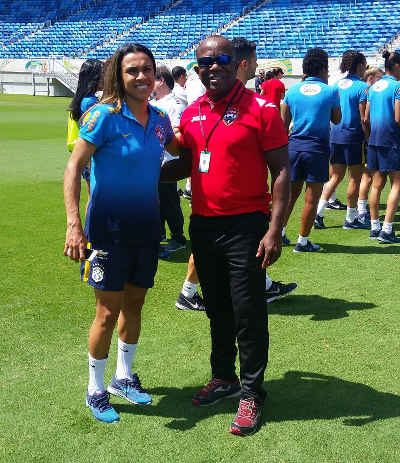 Photo: Former Trinidad and Tobago technical director Kendall Walkes (right) poses with Brazil international star Marta in Natal in December 2015.