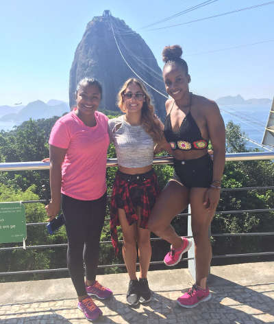 Photo: Trinidad and Tobago gymnasts Marisa Dick (centre) and Thema Wiliams (right) pose with therapist Nicole Fuentes while sightseeing in Rio De Janeiro on 18 April 2016. (Courtesy Hannifer Dick)