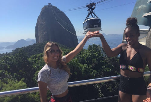 Photo: Trinidad and Tobago gymnasts Thema Williams (right) and Marisa Dick have fun sightseeing in Rio, after the Olympic Test event on 17 April 2016. (Courtesy Hannifer Dick)