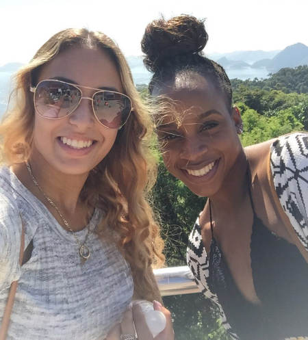 Photo: Trinidad and Tobago gymnasts Thema Williams (right) and Marisa Dick pose for a photograph while sightseeing in Rio, after the Olympic Test event on 17 April 2016. (Courtesy Hannifer Dick)