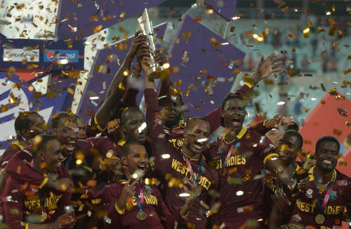 Photo: West Indies players celebrate after victory in the World T20 cricket final against England at The Eden Gardens Cricket Stadium in Kolkata on 3 April 2016. Are the highs of victory too high for the region's players? (Copyright AFP2016/Dibyangshu Sarkar)