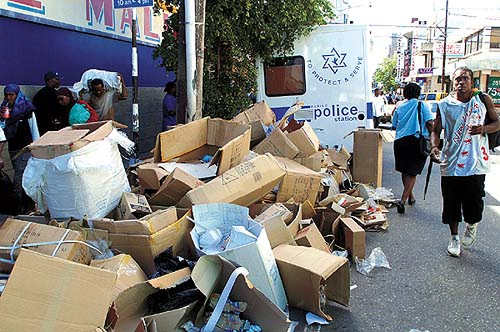 Photo: Garbage on Queen Street in Port of Spain. (Copyright Trinidad Guardian)