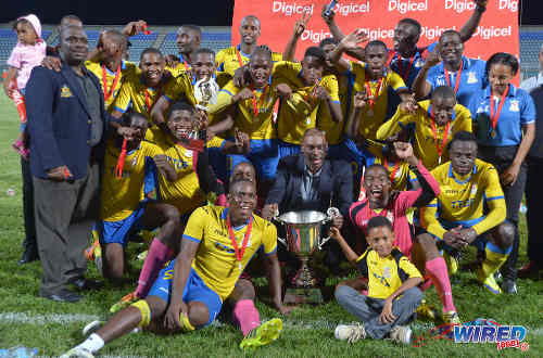 Photo: Cup that! Defence Force players celebrate after edging W Connection 2-1 in the Digicel Pro Bowl final on 27 May 2016 at the Ato Boldon Stadium in Couva. (Courtesy Chevaughn Christopher/Wired868)