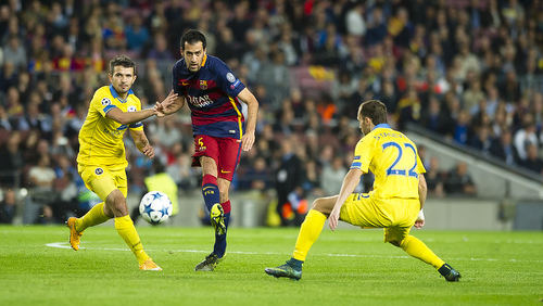 Photo: FC Barcelona midfielder Sergio Busquets (centre) in UEFA Champions League action against Bate Borisov on 4 November 2015. (Copyright FC Barcelona)