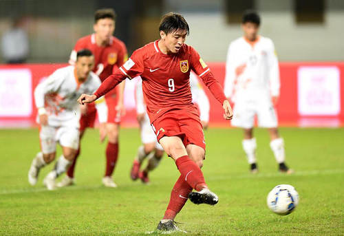 Photo: China attacker Yang Xu converts a penalty during international action. (Copyright China Daily)