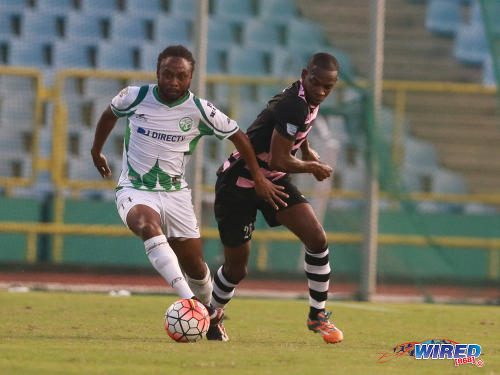 Photo: W Connection playmaker Andre Toussaint (left) holds off North East Stars captain Anthony Wolfe during the 2016 Pro Bowl semifinal on May 13 at the Hasely Crawford Stadium in Port of Spain. Connection won 4-2 on kicks from the penalty spot. (Courtesy Nicholas Bhajan/Wired868)