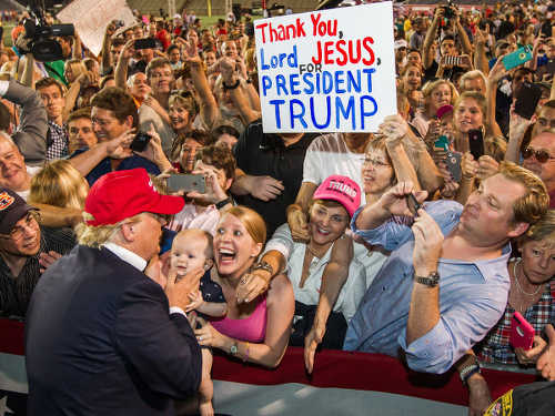 Photo: Republican president-elect Donald Trump (left) greets supporters at a political rally. (Copyright Business Insider)