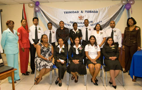 Photo: Immigration officers at their graduation ceremony with acting Deputy Chief Immigration Officer Veronica Ann King (far left), acting Deputy PS Destra Bascomber (second from left) and PS Jennifer Boucaud-Blake (far right) on 9 October 2009. (Copyright Immigration.Gov.TT)