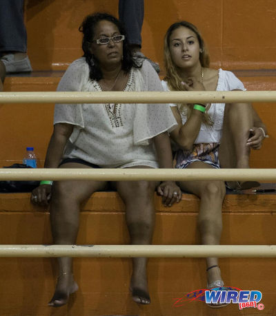 Photo: Trinidad and Tobago gymnast Marisa Dick (right) and her mother Hannifer Dick (centre) look on at a local gymnastics meet at the Tacarigua Indoor Sporting Facility on 23 April 2016. (Courtesy Wired868)