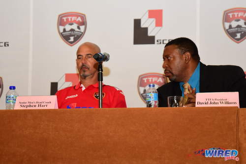 Photo: Trinidad and Tobago National Senior Team head coach Stephen Hart (left) and Trinidad and Tobago Football Association (TTFA) president David John-Williams enjoy each other's company during a press conference at the Hyatt Regency hotel in Port of Spain on 19 May 2016. (Courtesy Wired868)