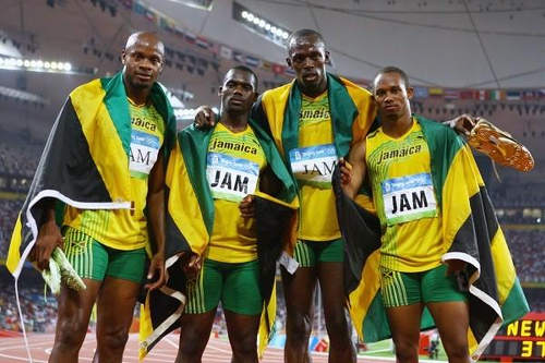 Photo: Jamaica 4x100 Beijing Olympic Games team (from left) Asafa Powell, Nesta Carter, Usain Bolt and Michael Frater. (Copyright IOC/Getty)