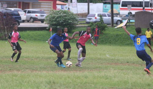 Photo: Crown Trace attacker Jevaughn Humphrey (second from right) was a handful against FC Santa Rosa in Republic Bank National Youth League action on 11 June 2016 in Macoya. Humphrey scored one and set up another as Crown Trace won 3-0 the East Zone Under-16 fixture. (Courtesy Chevaughn Christopher/All Sport)