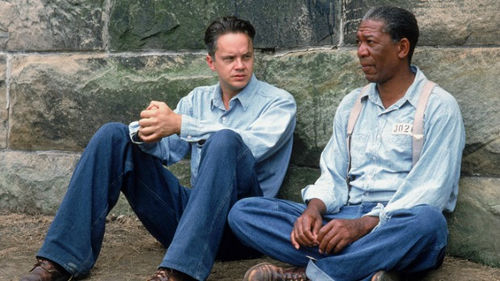 Photo: Andy Dufresne, played by the actor Tim Robbins (left), shares a moment with Red, played by Morgan Freeman, in the memorable movie, Shawshank Redemption.