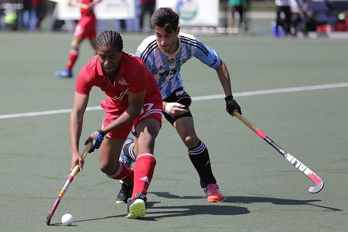 Photo: Trinidad and Tobago international Tariq Marcano (left) in action against Argentina in the Toronto 2016 Pan American Men's Junior Hockey Championships.