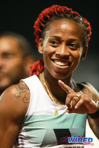 Photo: Rebirth sprinter Michelle-Lee Ahye beams after setting a new Trinidad and Tobago record of 22.33 in the women's 200 metre event at the NAAA National Open Championships on 26 June 2016 at the Hasely Crawford Stadium, Port of Spain. (Courtesy Allan V Crane/Wired868)