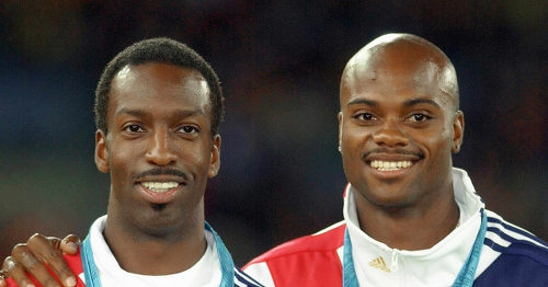 Photo: Former United States track star Alvin Harrison (right) poses with 4x400 teammate and Olympic legend Michael Johnson during the Atlanta 1996 Olympics. Henderson is now president of the Olympians Athletic Union.