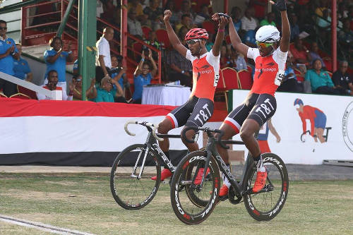 Photo: Trinidad and Tobago cyclist Varun Maharaj (left) celebrates during the 2015 Southern Games.