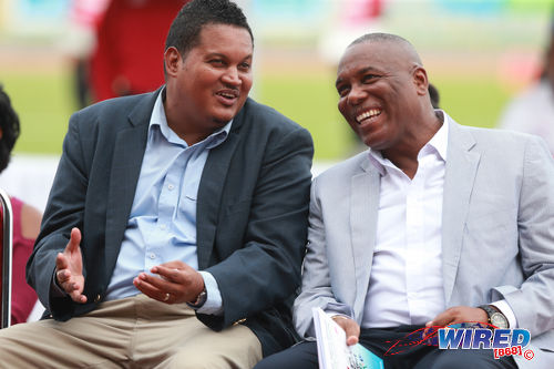 Photo: Trinidad and Tobago Sport Minister Darryl Smith (left) has a laugh with NAAA president Ephraim Serrette at the 2016 NAAA Open Championships at the Hasely Crawford Stadium, Port of Spain on 25 June 2016. (Courtesy Allan V Crane/Wired868)