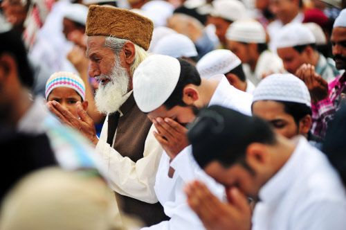 Photo: Muslim worshippers say prayers at Eid ul Fitr.