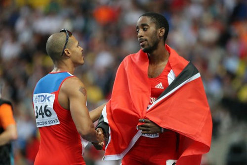 Photo: Dominican Republic’s Felix Sanchez (left) shakes hands with Trinidad and Tobago’s Jehue Gordon who won the men’s 400 metres hurdles final at the Moscow 2013 IAAF World Championships at the Luzhniki Stadium on15 August 2013. (Copyright AFP2016/Yuri Kadobnov)