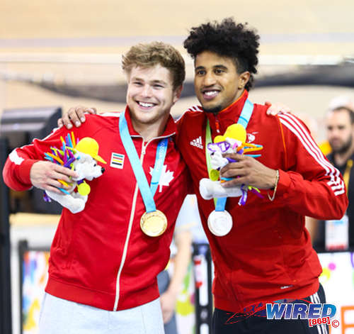 Photo: Canada cyclist Hugo Barrett (left) and Trinidad and Tobago's Njisane Phillip show off their gold and silver medal returns respectively at the Toronto 2015 Pan American Games. (Courtesy Allan V Crane/CA Images/Wired868)