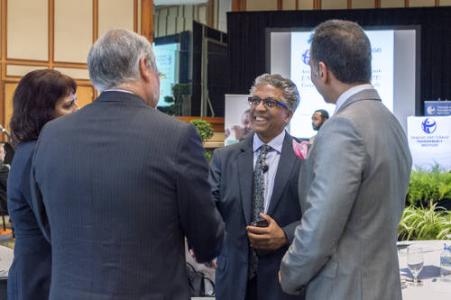 Photo: Law Association of Trinidad and Tobago (LATT) president Reginald Armour SC (centre) meets and greets at the Transparency Institute anti-corruption conference on 8 March 2016. (Copyright Shaun Rambaran/forge.co.tt)