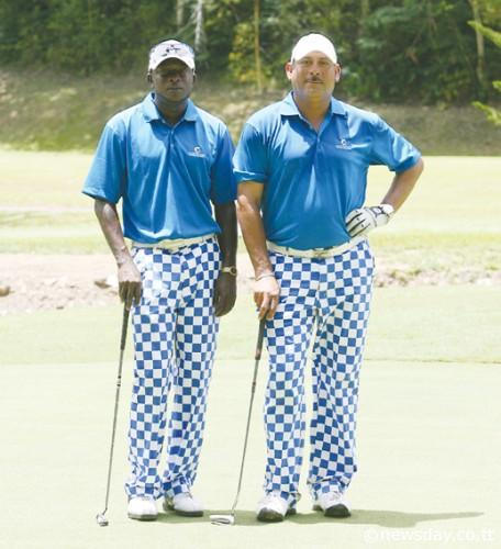 Photo: Businessman Andy Gomez-Burke (right) poses with fellow golfer Desmond Ambrose at the Cotton Tree Foundation Charity Golf competition.