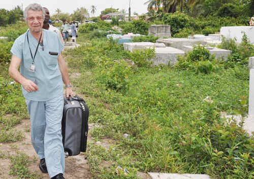 Photo: Pathologist Dr Valery Alexandrov heads to work at a local cemetery. (Copyright Kaiteurnewsonline)