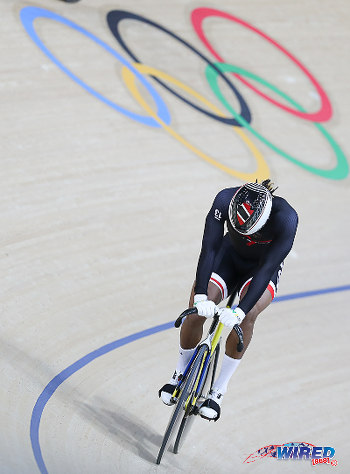 Photo: Trinidad and Tobago cyclist Njisane Phillip gathers his thoughts during action at the Rio 2016 Olympics on 12 August. (Courtesy Sean Morrison/Wired868)