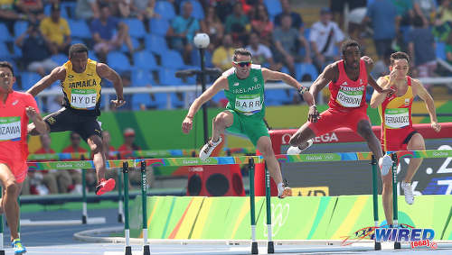 Photo: Trinidad and Tobago's Jehue Gordon (second from right) challenges competitors (from left) Keisuke Nozawa (Japan), Jaheel Hyde (Jamaica), Thomas Barr (Ireland) and Sergio Fernandez in the 400 metre hurdle heats at the Rio 2016 Olympics on 15 August 2016. (Copyright Sean Morrison/Wired868)