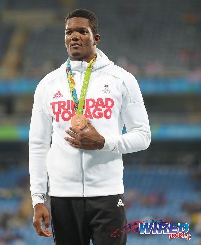 Photo: Trinidad and Tobago’s Keshorn Walcott shows off his bronze medal after finishing third in the Men’s Javelin Throw Final at the Rio 2016 Olympic Games on 20 August 2016.  (Courtesy Sean Morrison/Wired868)