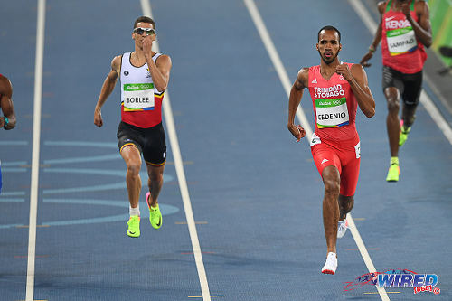 Photo: Trinidad and Tobago's Machel Cedenio (centre) cruises to victory in the first round of the 400 metre event at the Rio 2016 Olympics on 13 August. (Courtesy: Sean Morrison/Wired868)