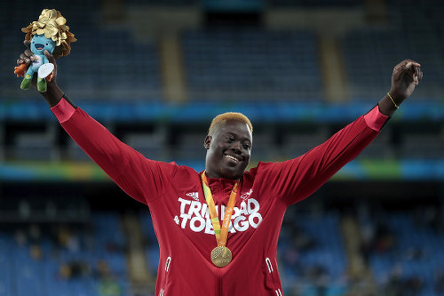 Photo: Trinidad and Tobago's Akeem Stewart celebrates his gold medal performance in the javelin event at the Rio 2016 Paralympic Games on 9 September 2016. (Copyright Alexandre Loureiro/Getty Images)